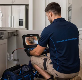 Clearing a blocked sink at a Cherrybrook property